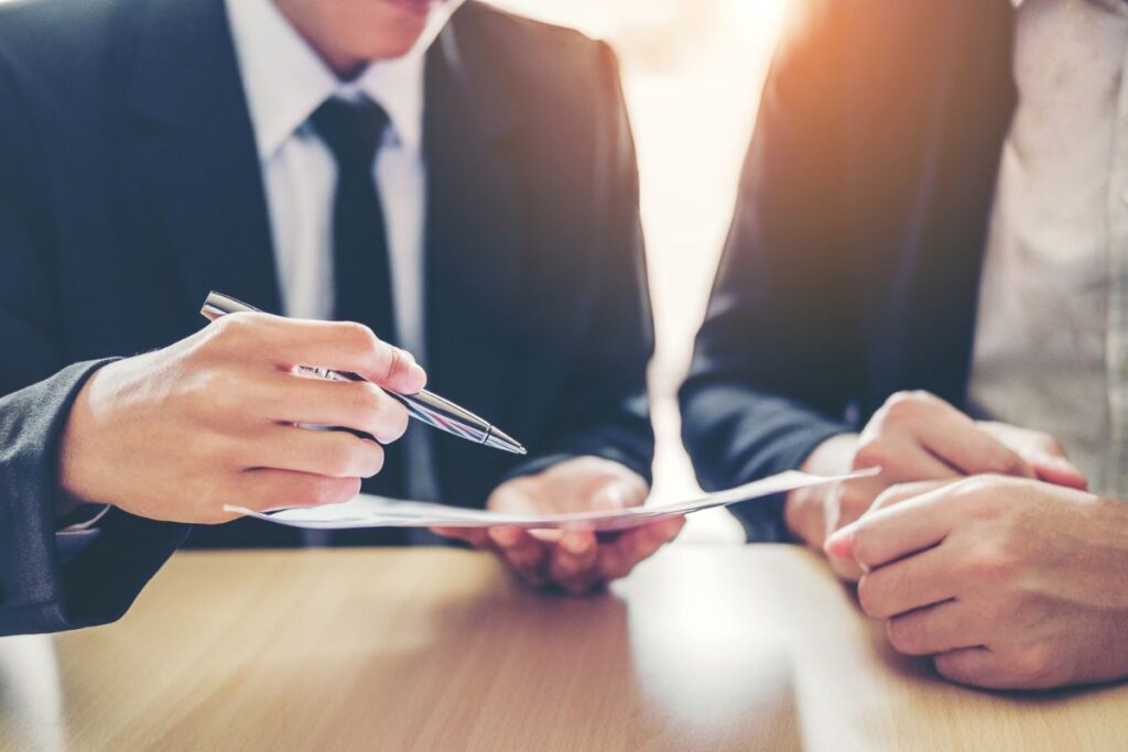 business professionals reviewing documents