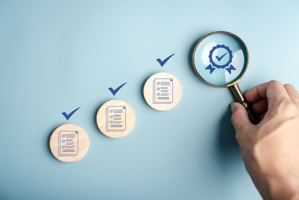 Checklist and magnifying glass representing a thorough business valuation review process