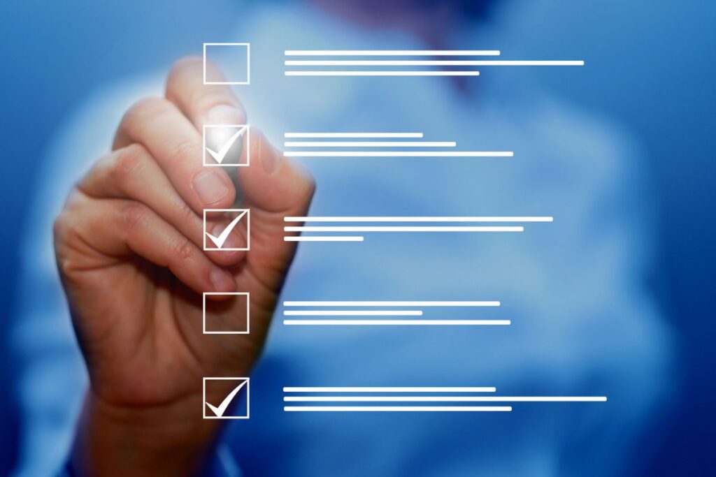 Close-up of a person selecting items on a digital checklist
