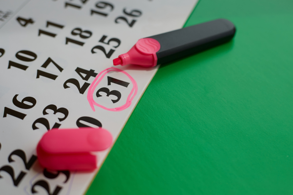 Month-end financial reporting and accounting documents on a desk